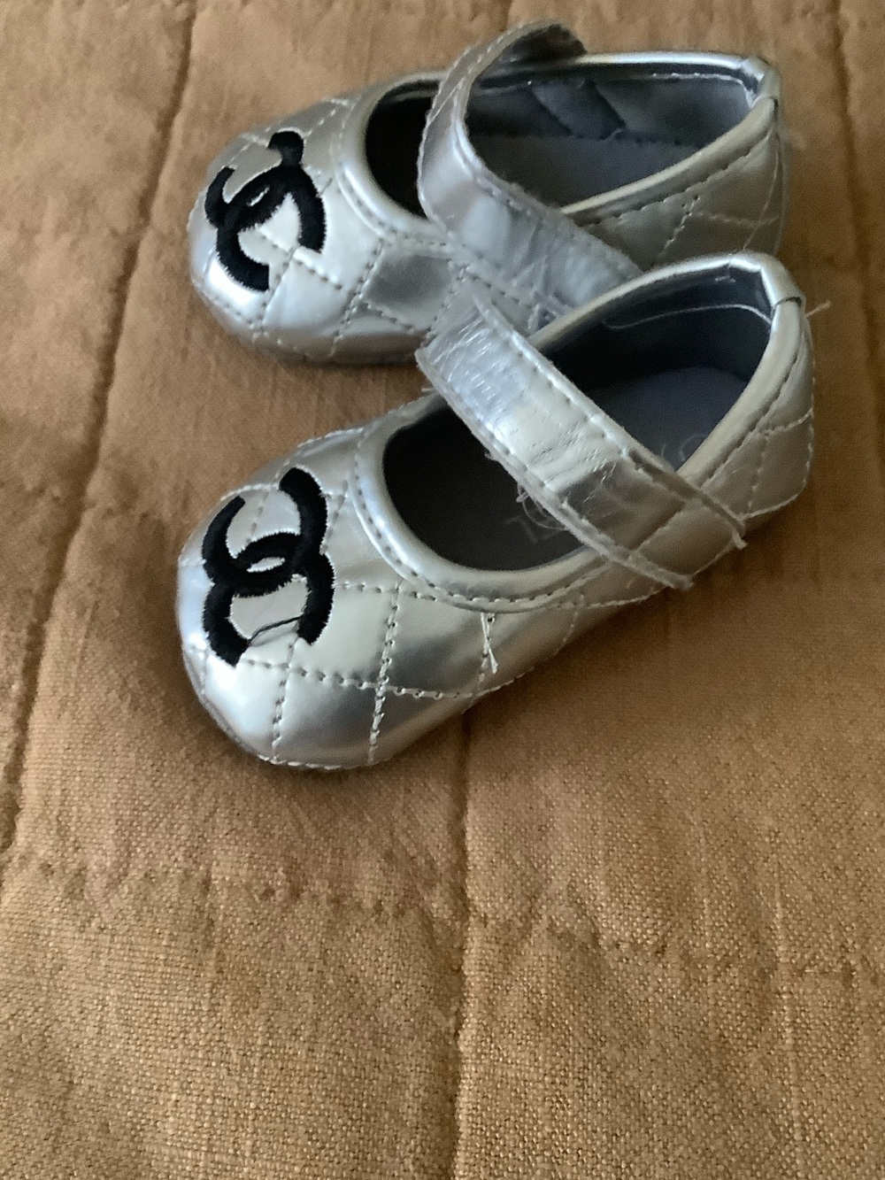 CHANEL Metallic Silver Quilted Baby Mary Janes with Black CC Accent